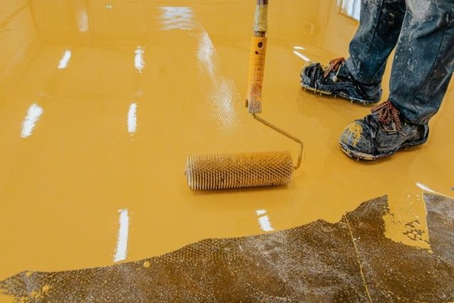 installing epoxy to floor